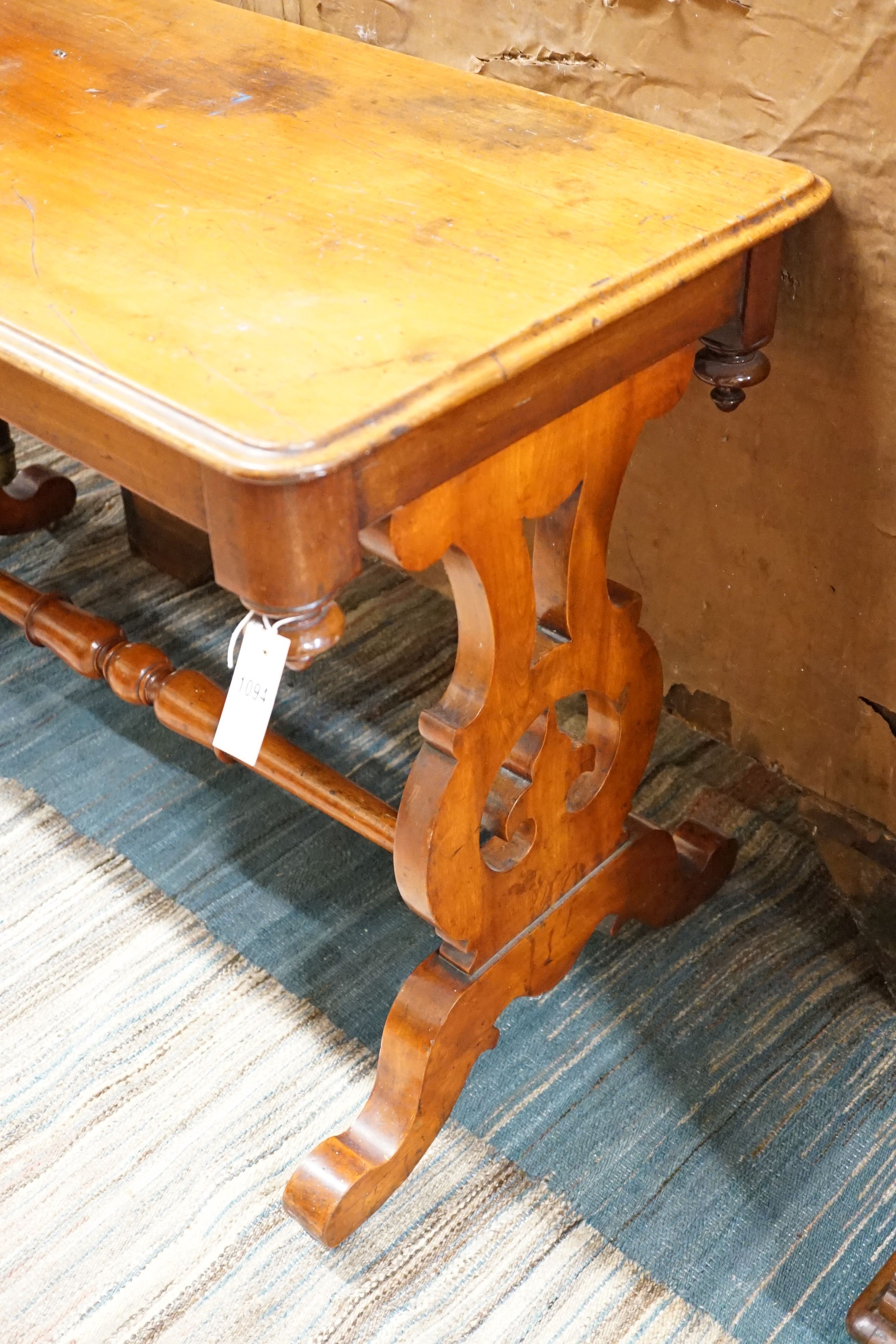 A late Victorian mahogany centre table, width 106cm, height 71cm and a Victorian mahogany centre table with associated broken marble top, width 109cm, height 56cm